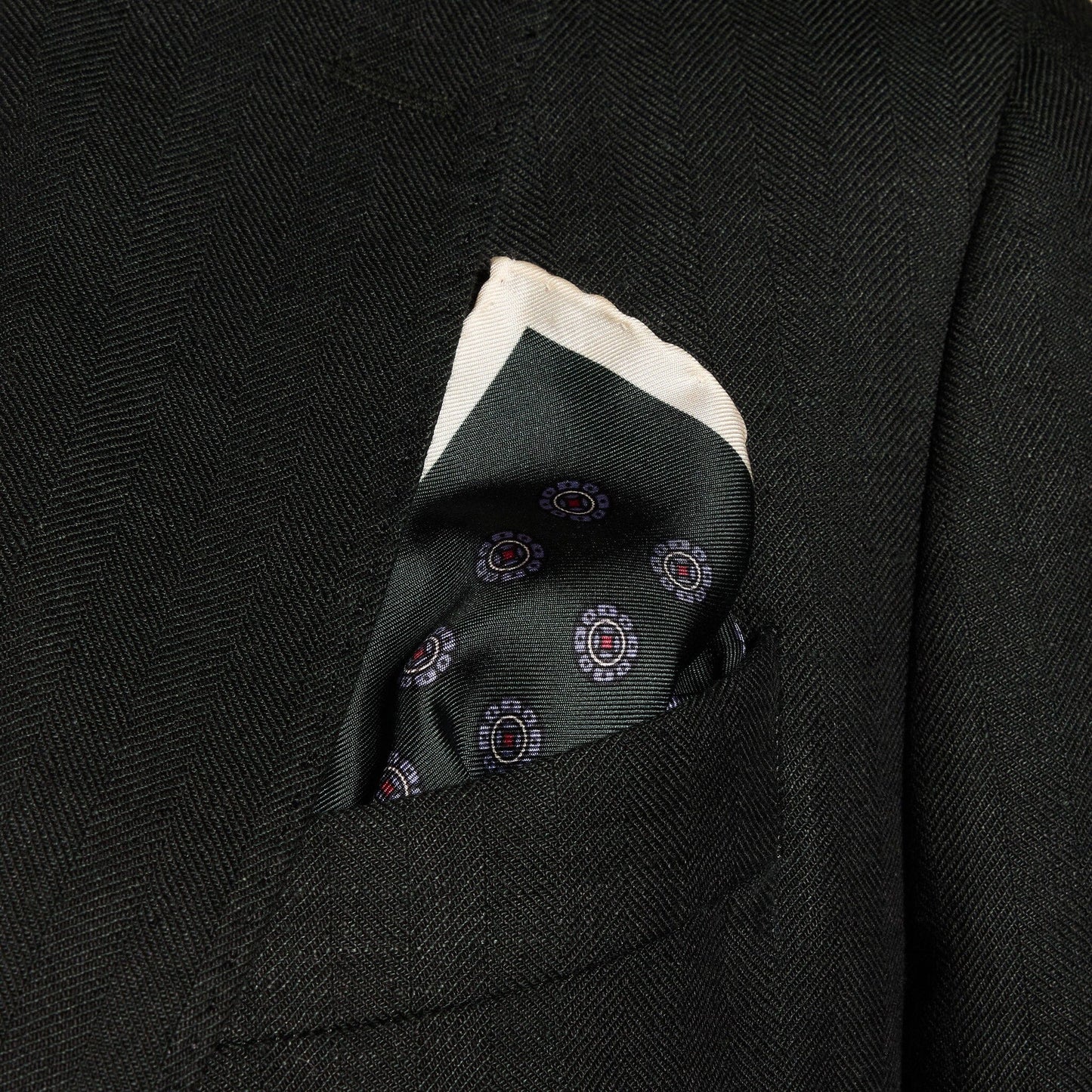 Pochette en soie verte à motifs