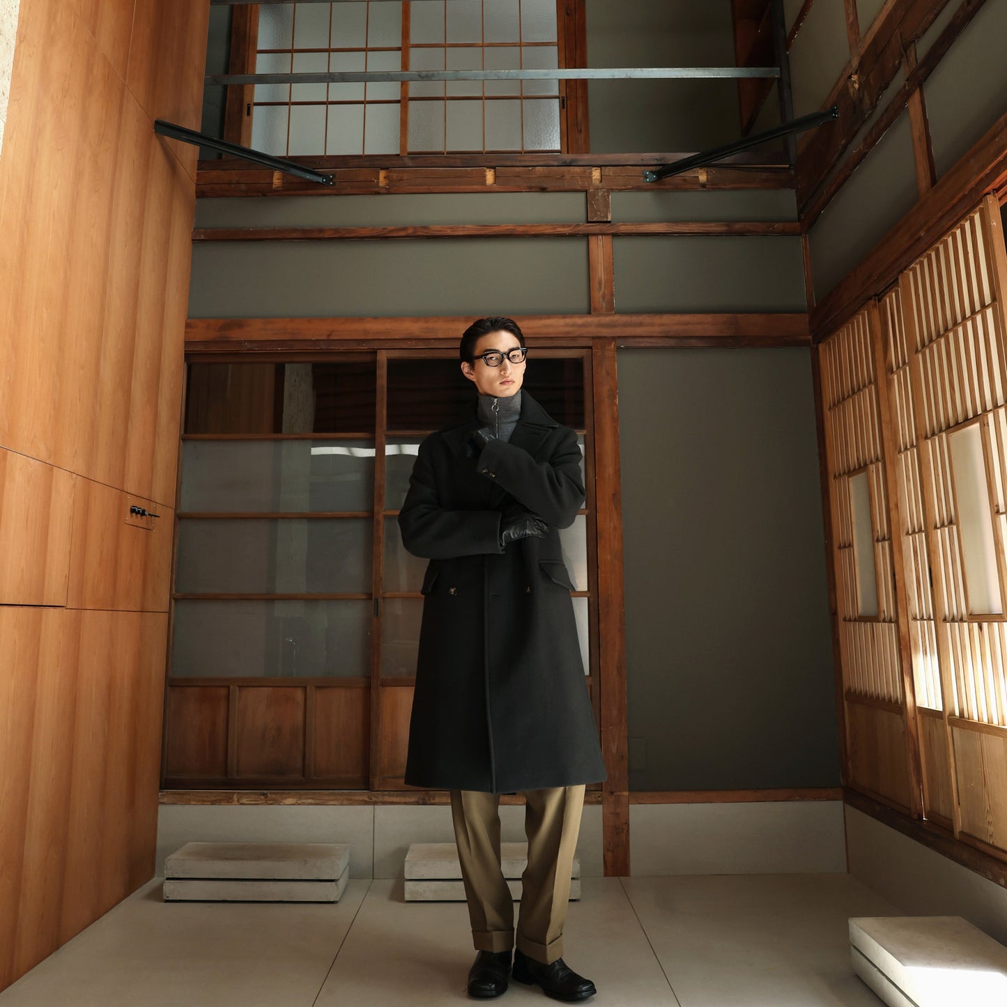 Double-breasted coat in green wool