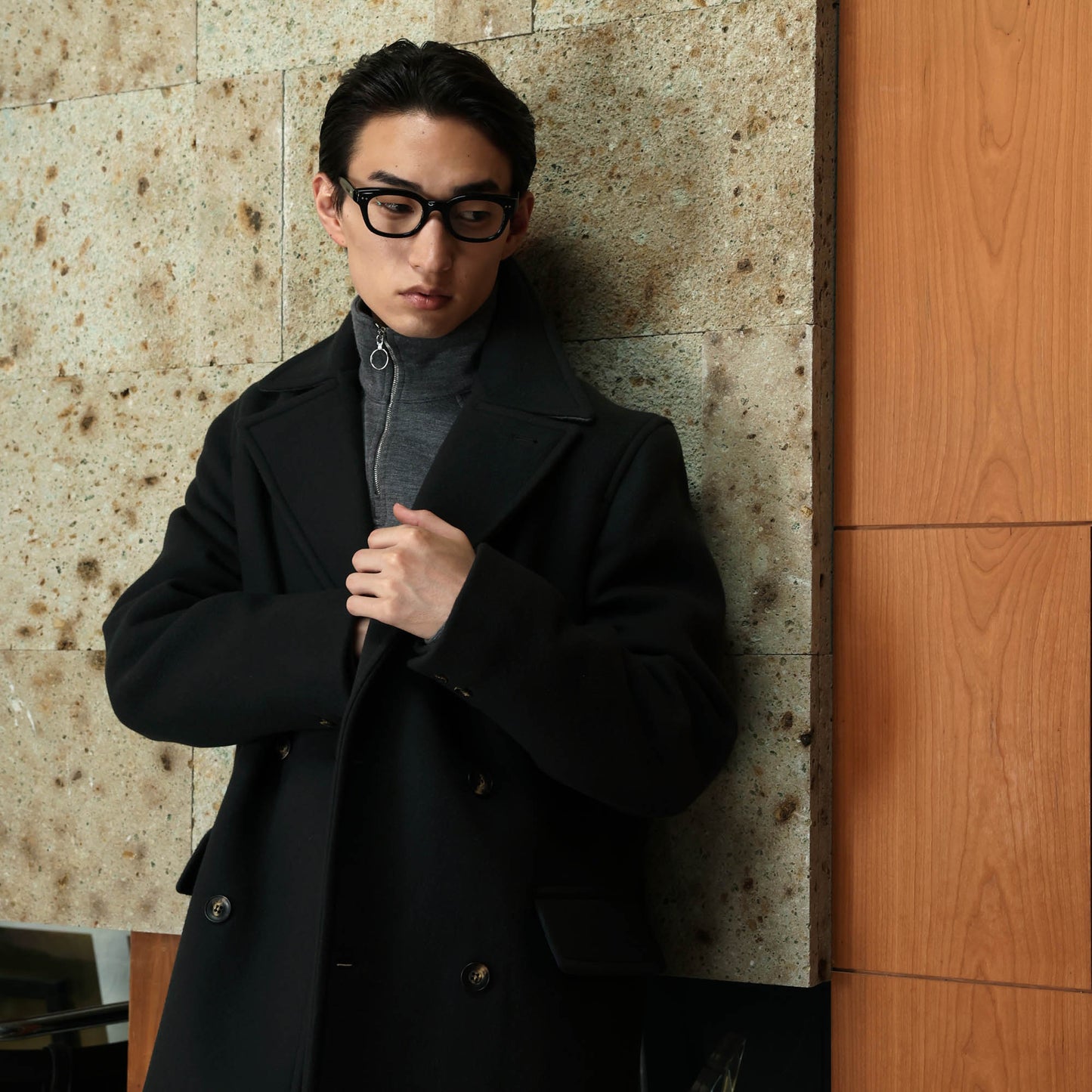 Double-breasted coat in green wool