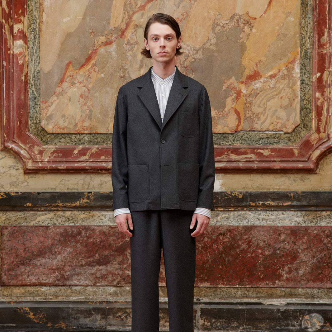 Deconstructed tailored jacket in gray wool flannel