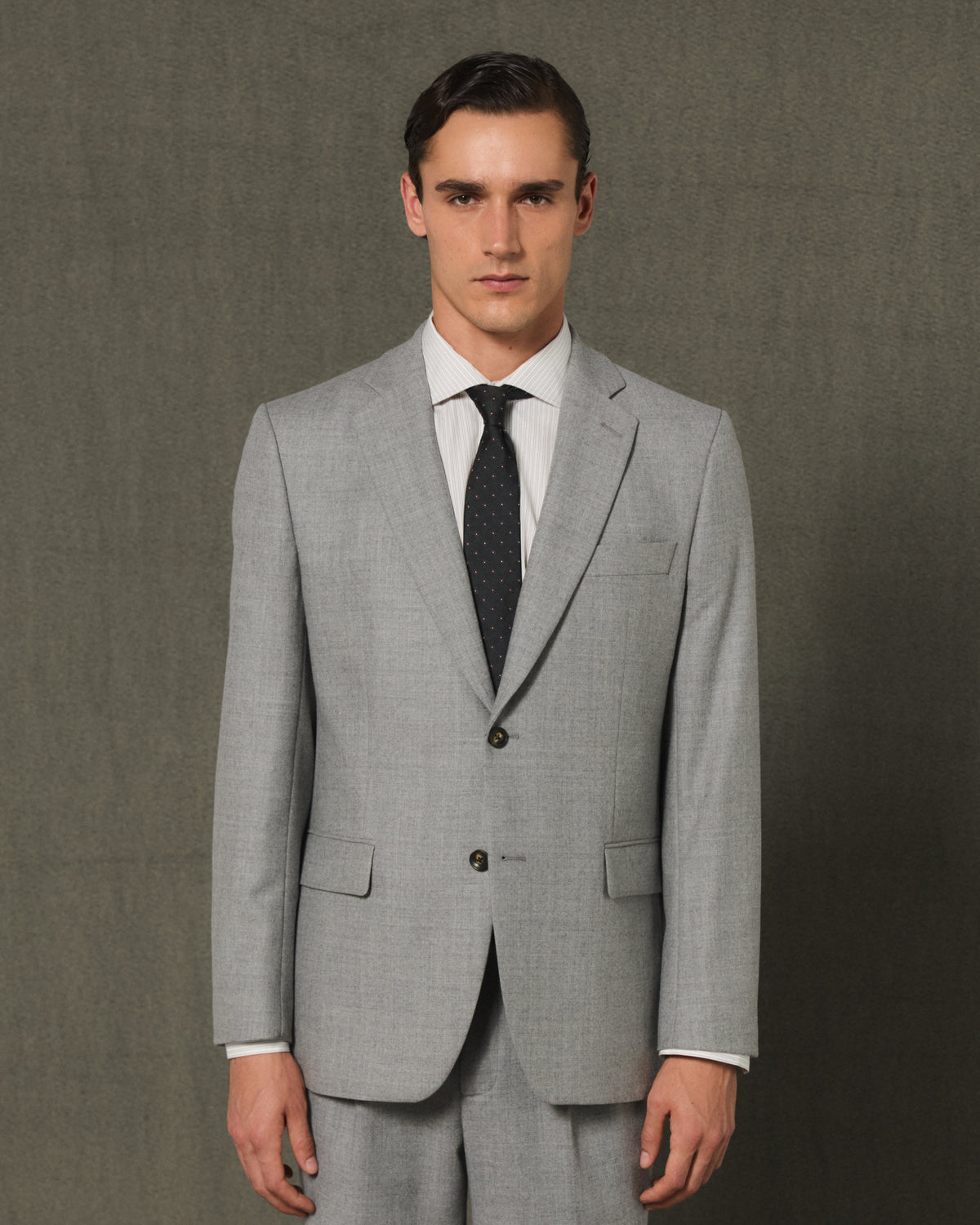 Grey wool flannel suit with straight-leg trousers