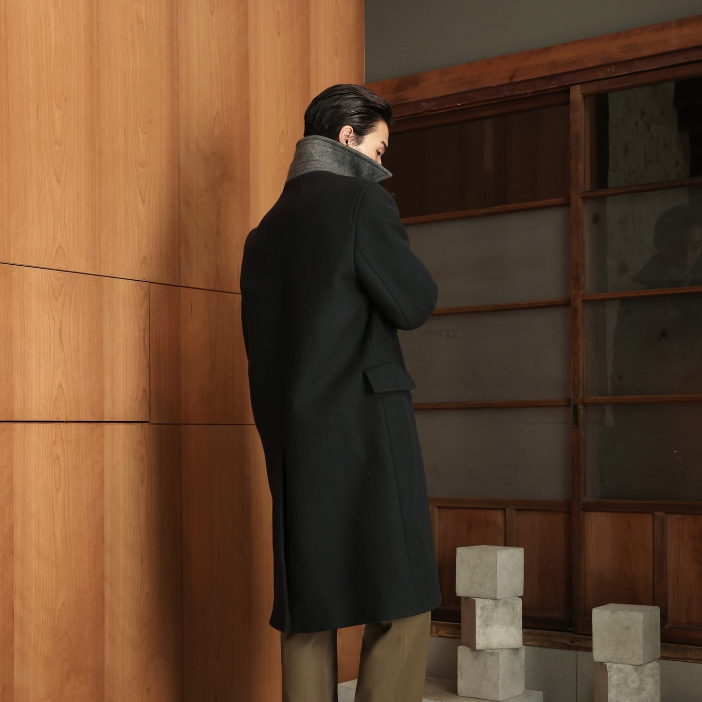 Double-breasted coat in green wool