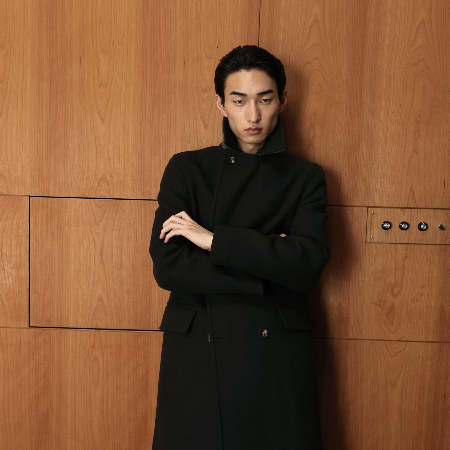 Double-breasted coat in green wool