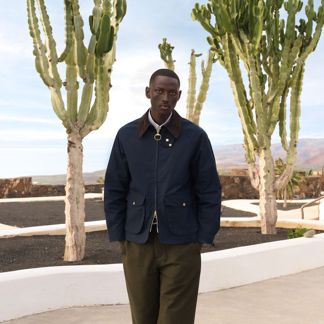 Blouson en coton ciré bleu col velours marron