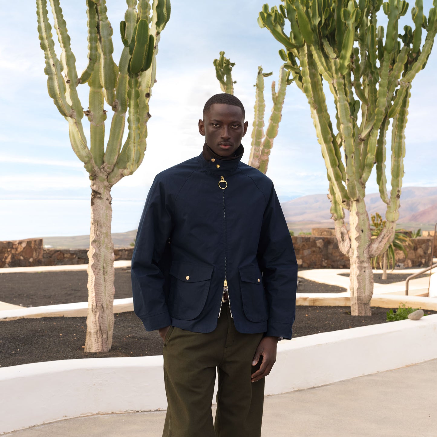 Blouson en coton ciré bleu col velours marron