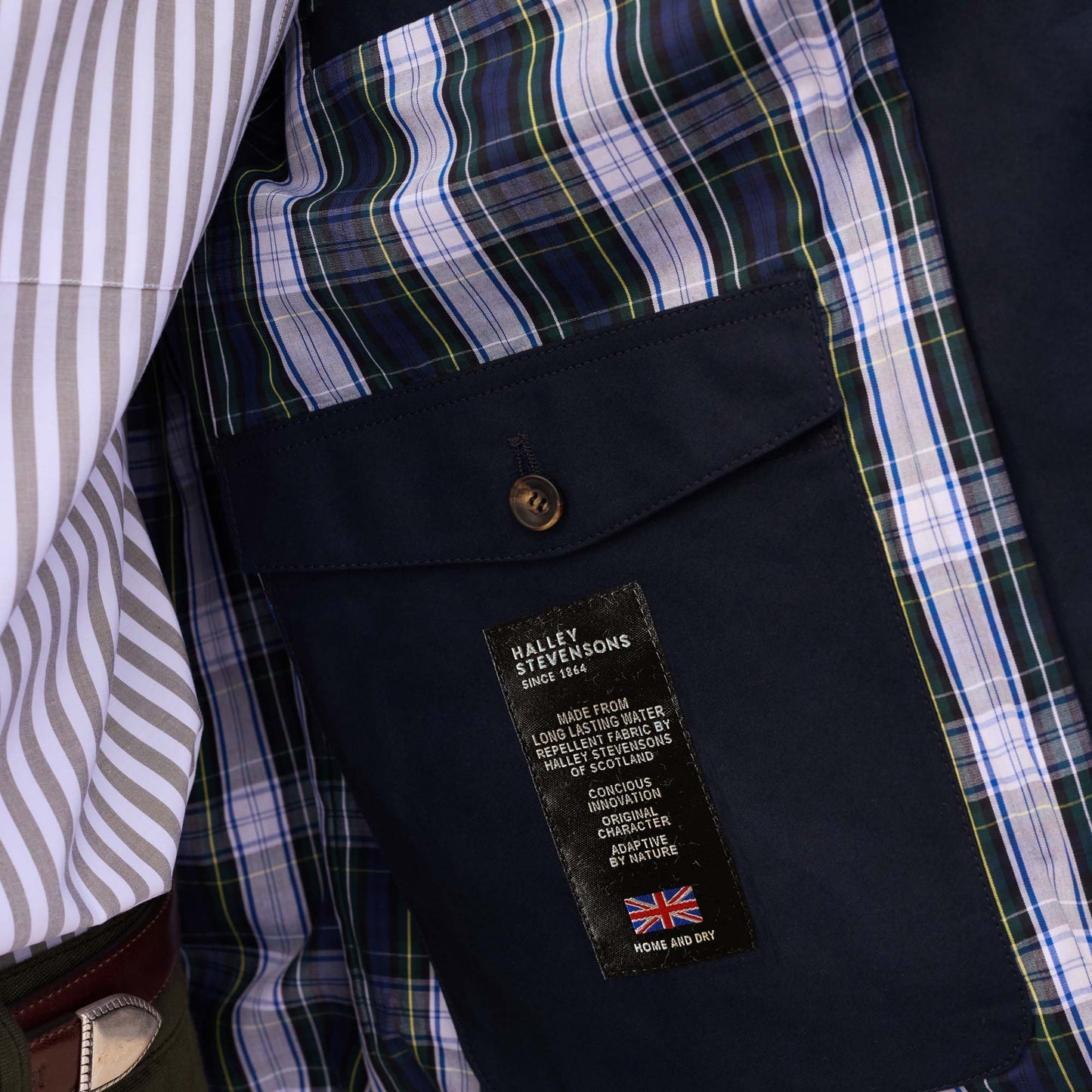 Blouson en coton ciré bleu col velours marron