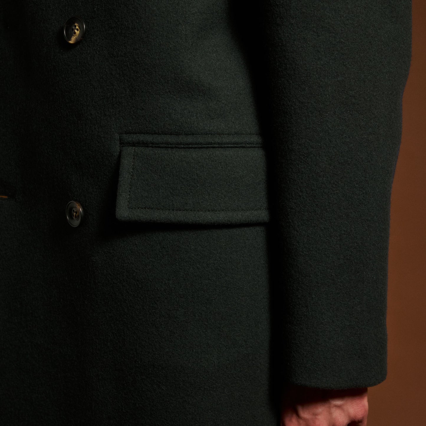 Double-breasted coat in green wool