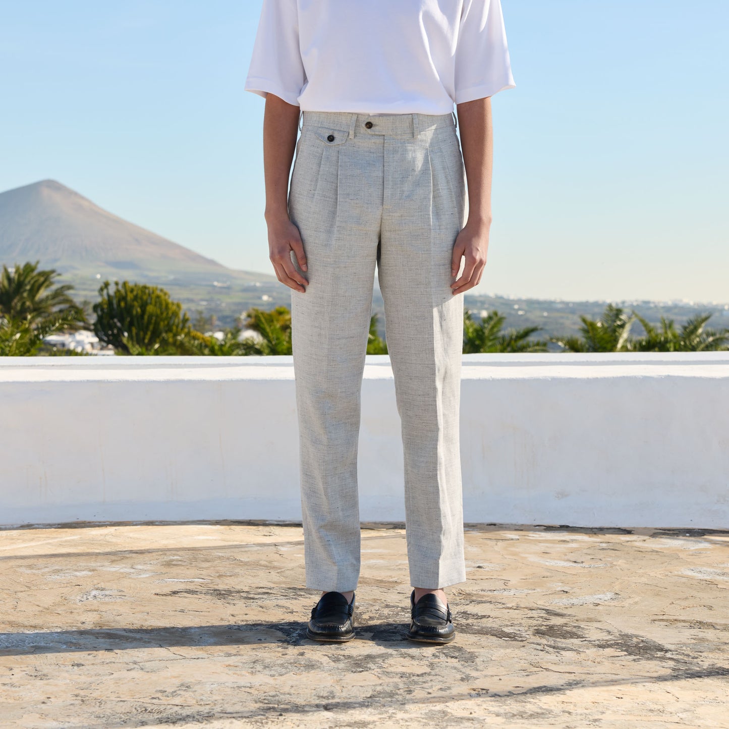 Double-pleated linen and cotton trousers with heathered micro-herringbone pattern