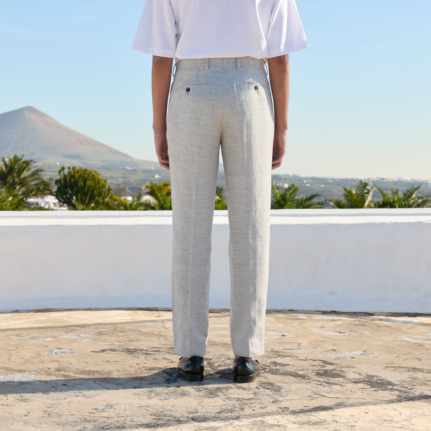 Double-pleated linen and cotton trousers with heathered micro-herringbone pattern