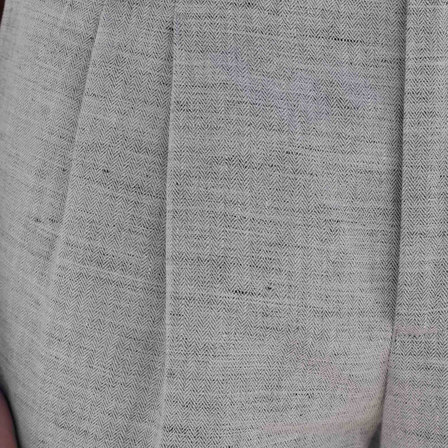 Double-pleated linen and cotton trousers with heathered micro-herringbone pattern