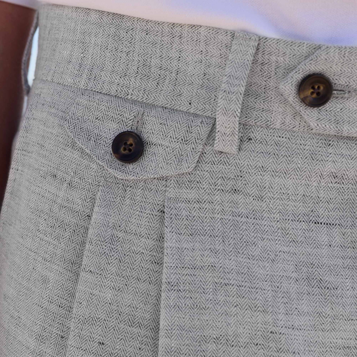 Double-pleated linen and cotton trousers with heathered micro-herringbone pattern