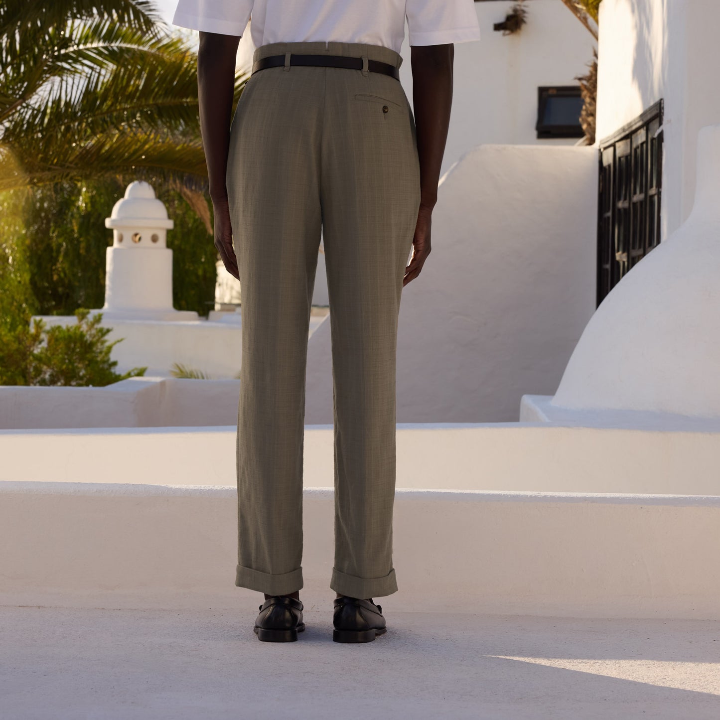 Brown pleated drop-loop trousers