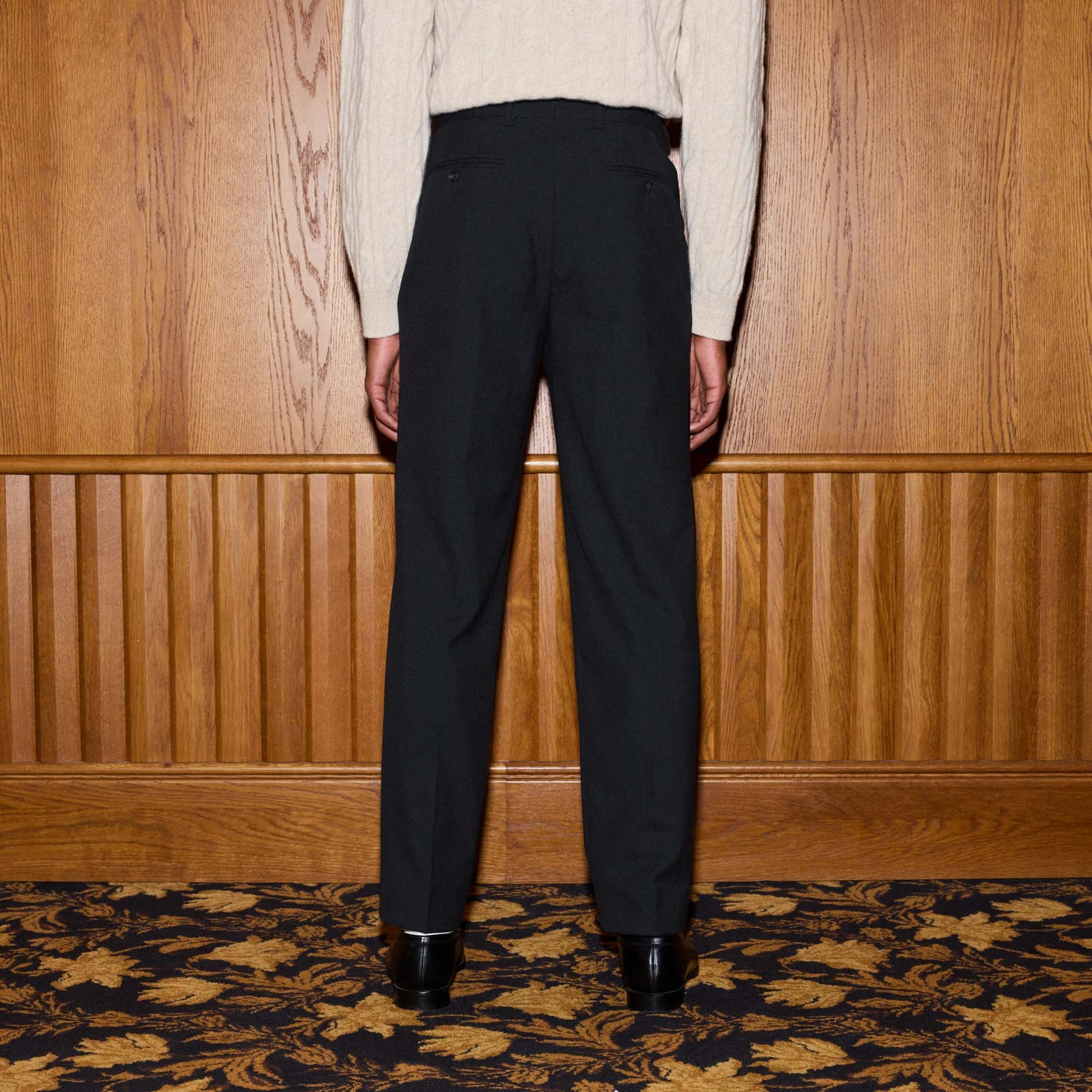 Pantalon à double plis en laine noire