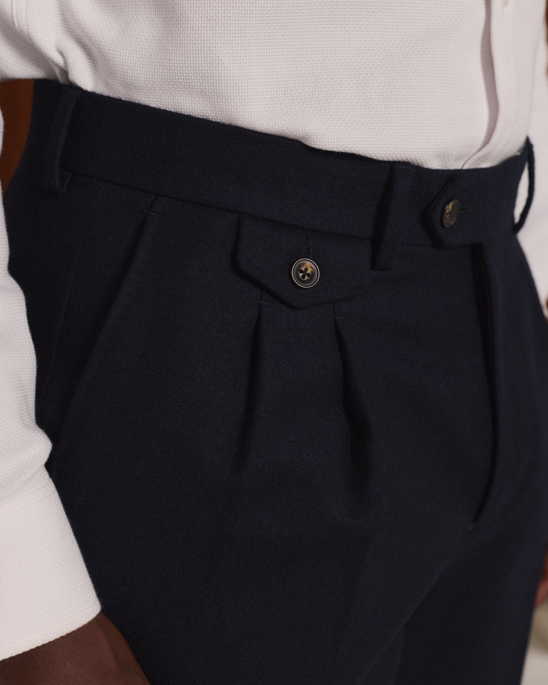 Navy flannel pleated trousers