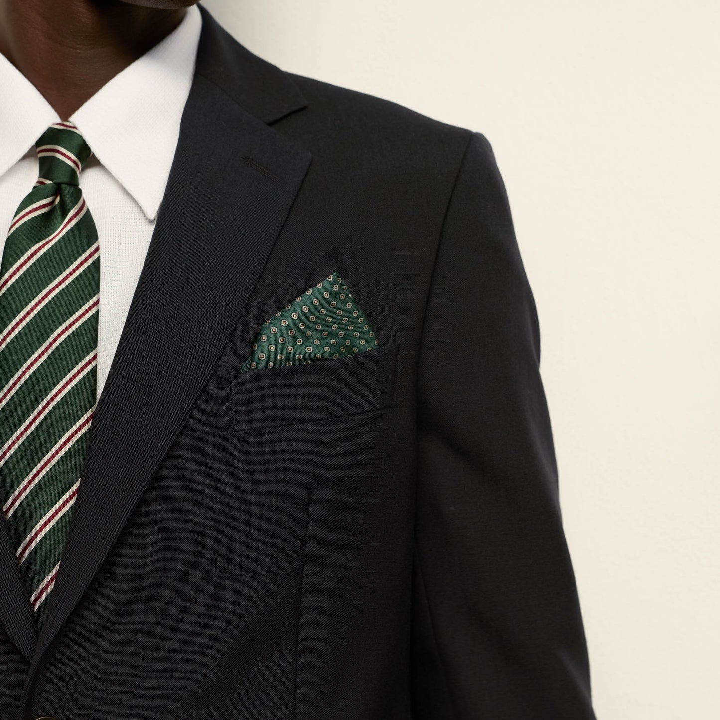 Patterned green silk clutch