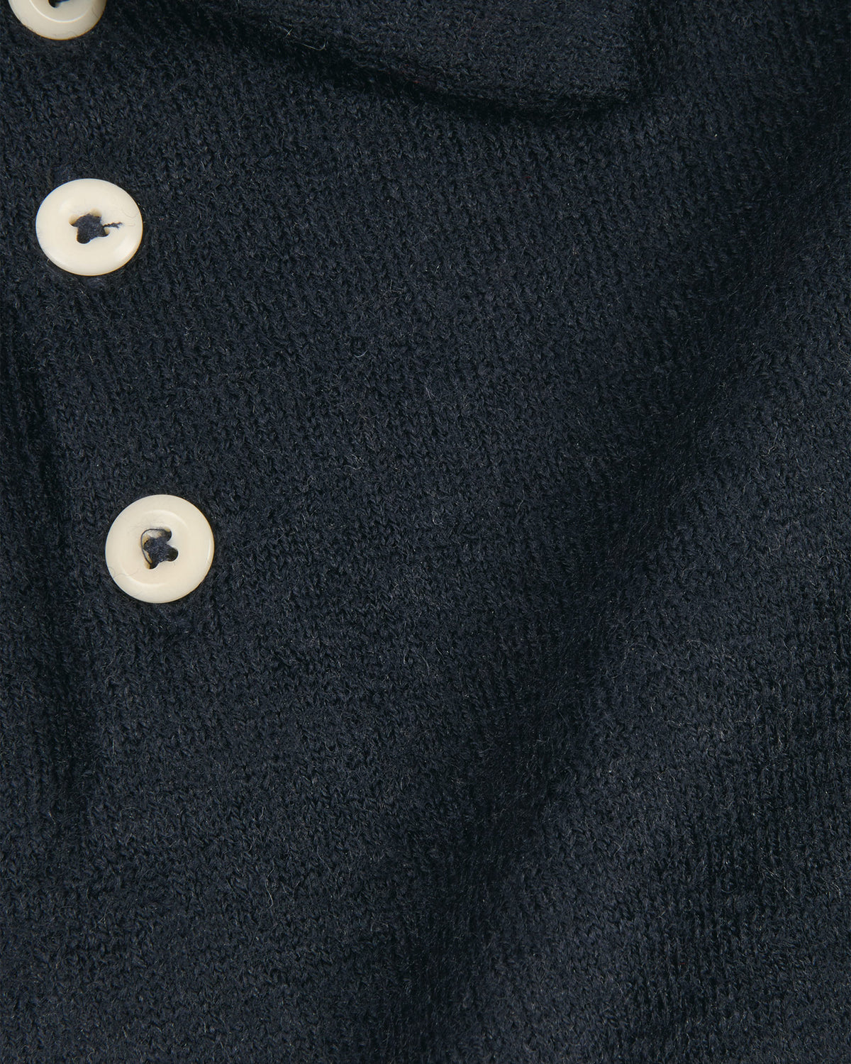 Polo manches longues en laine marine
