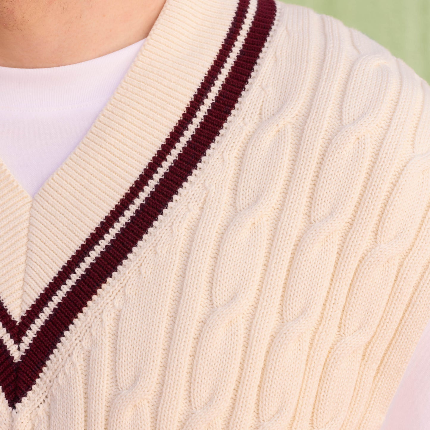 Sleeveless sweater in ecru and burgundy cotton