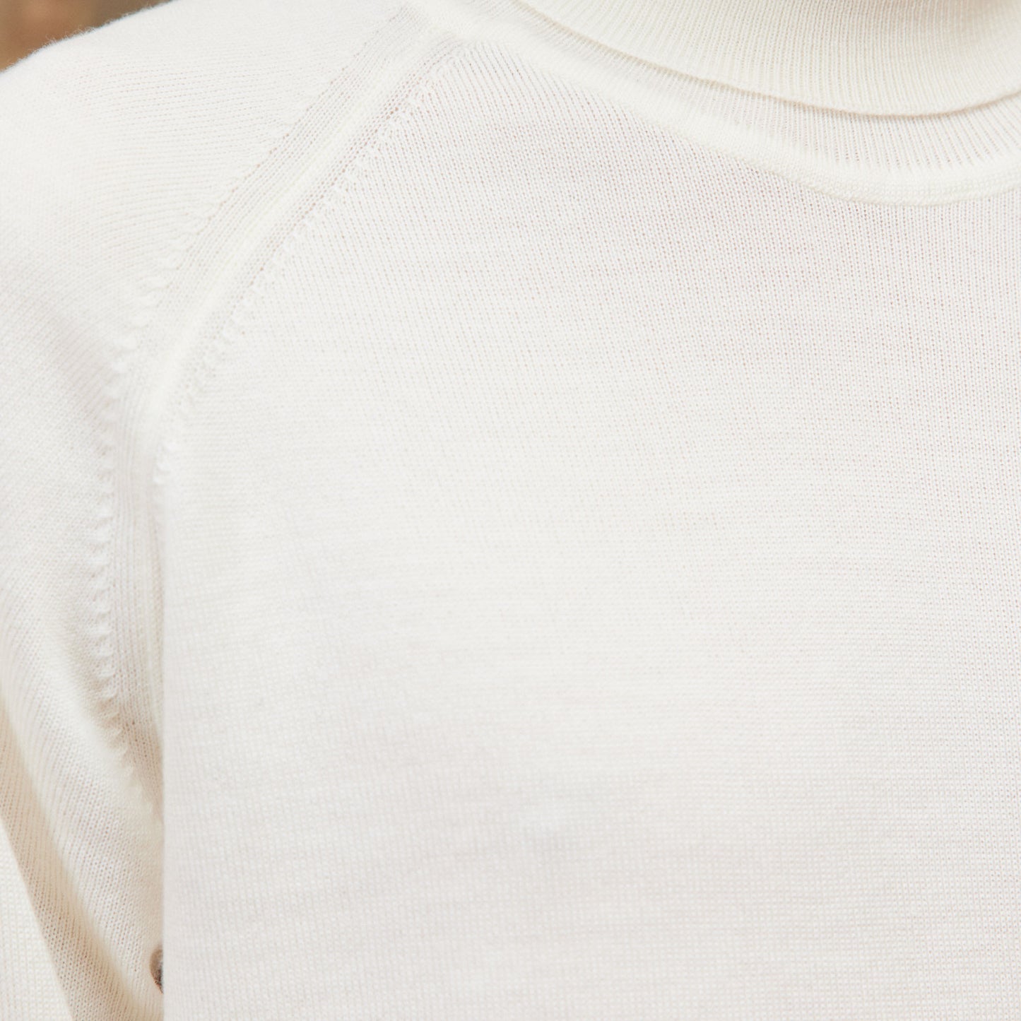 Pull à col roulé en laine mérinos écru