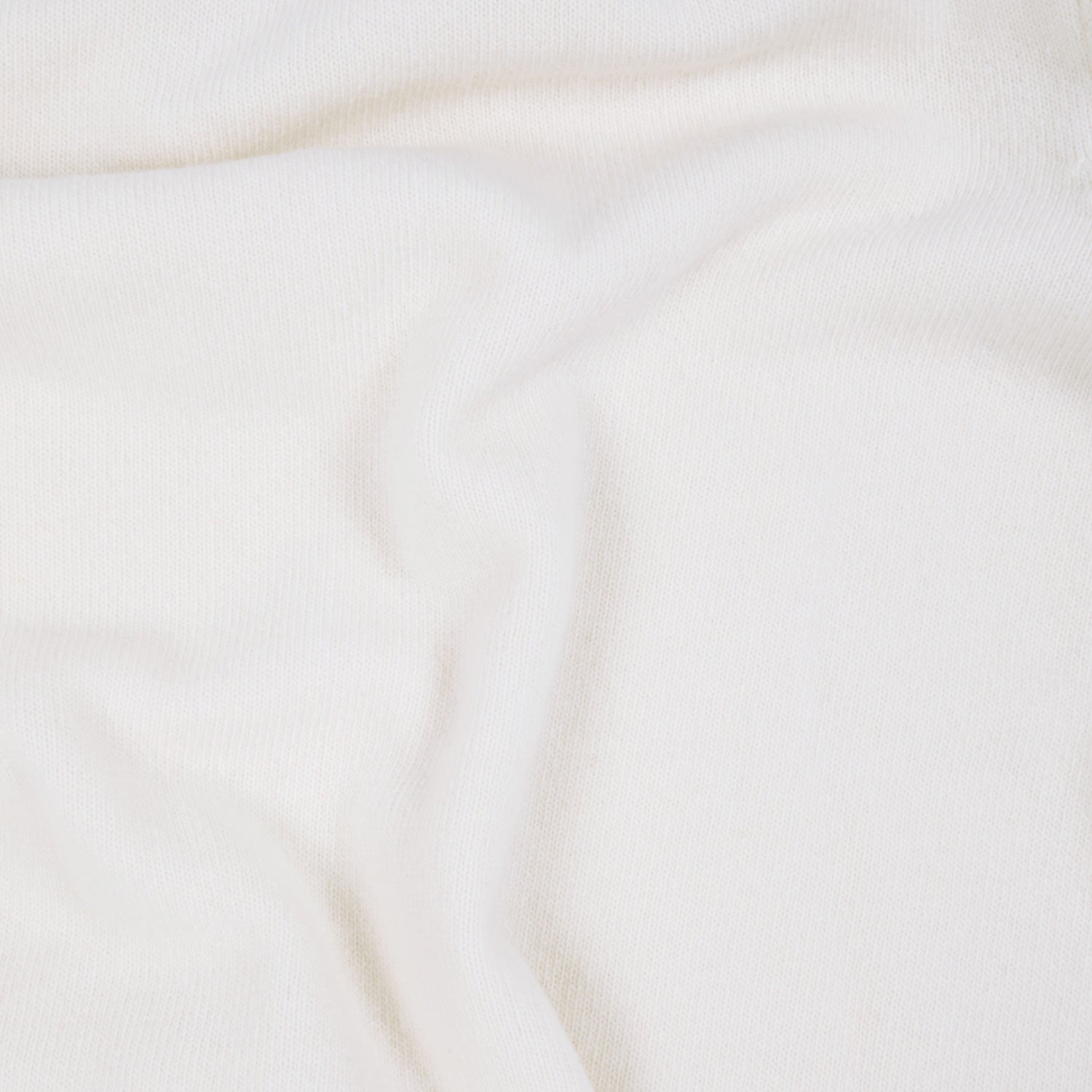 Pull à col polo en laine mérinos écru