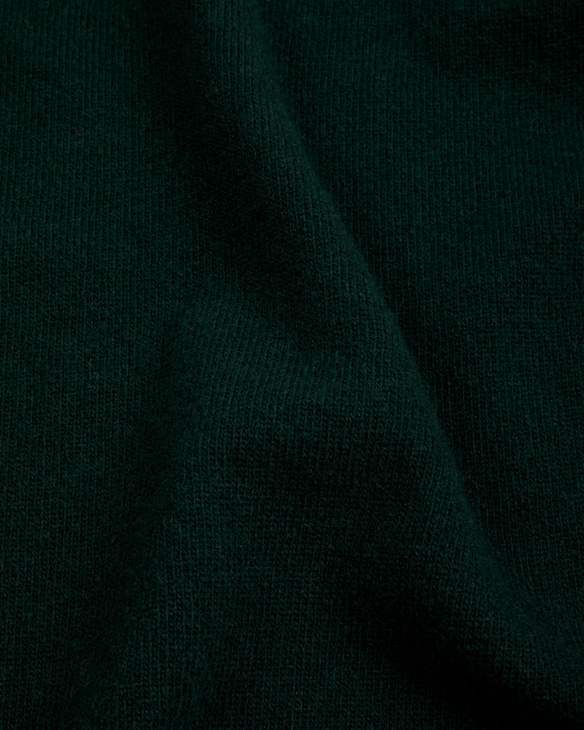 Grüner Rollkragenpullover aus extrafeiner Wolle