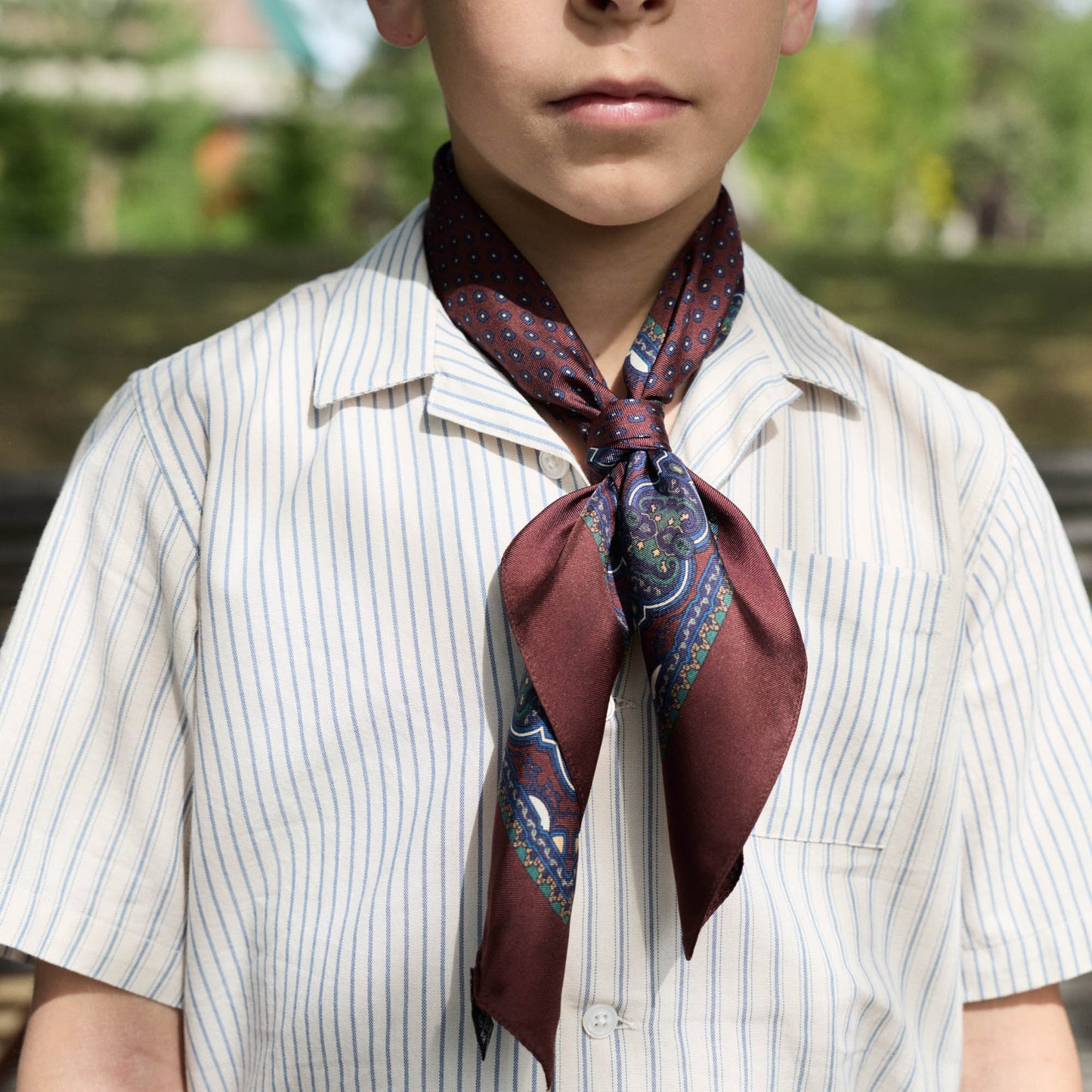 Kids' short-sleeved white and blue striped shirt