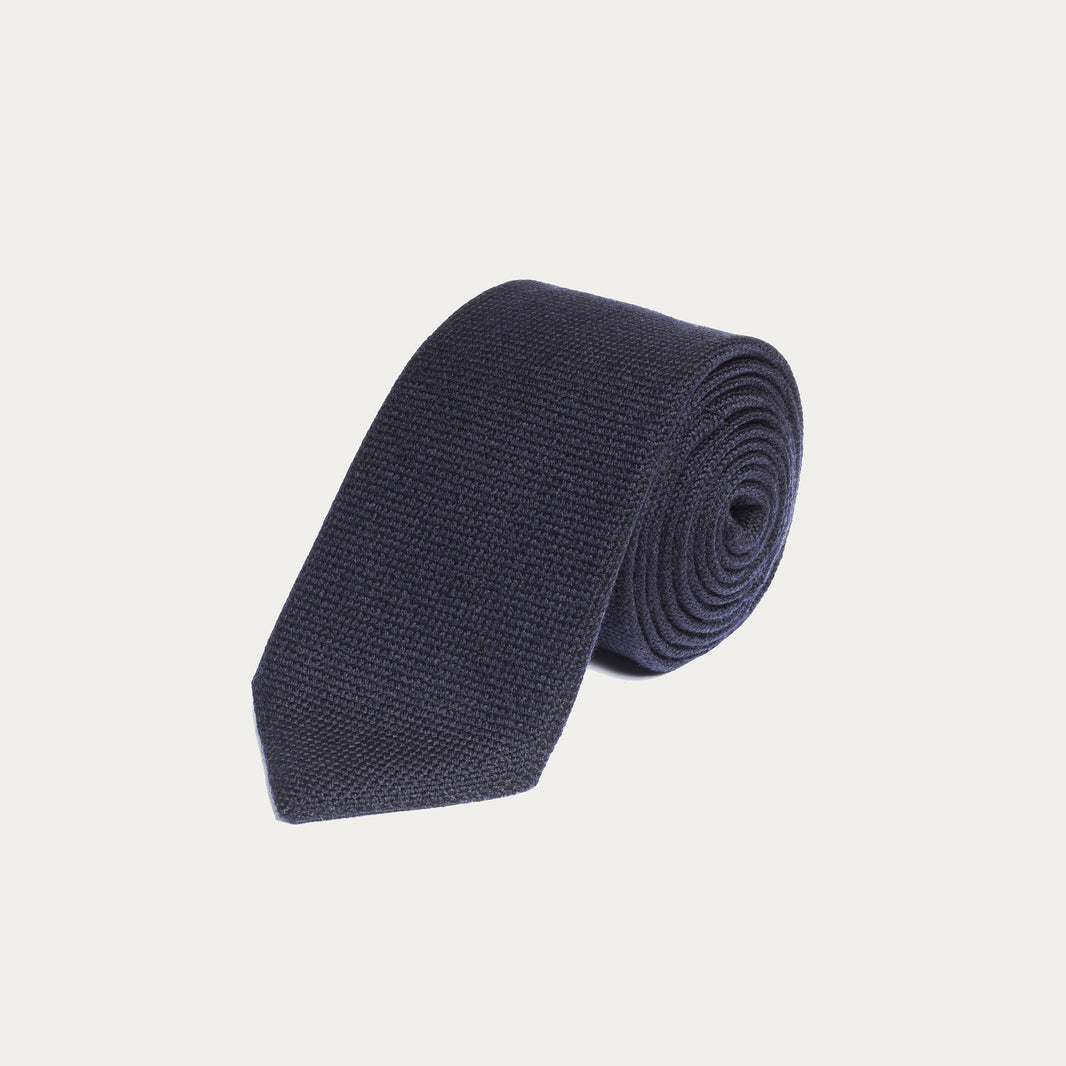 Cravate bleu foncé en laine et soie