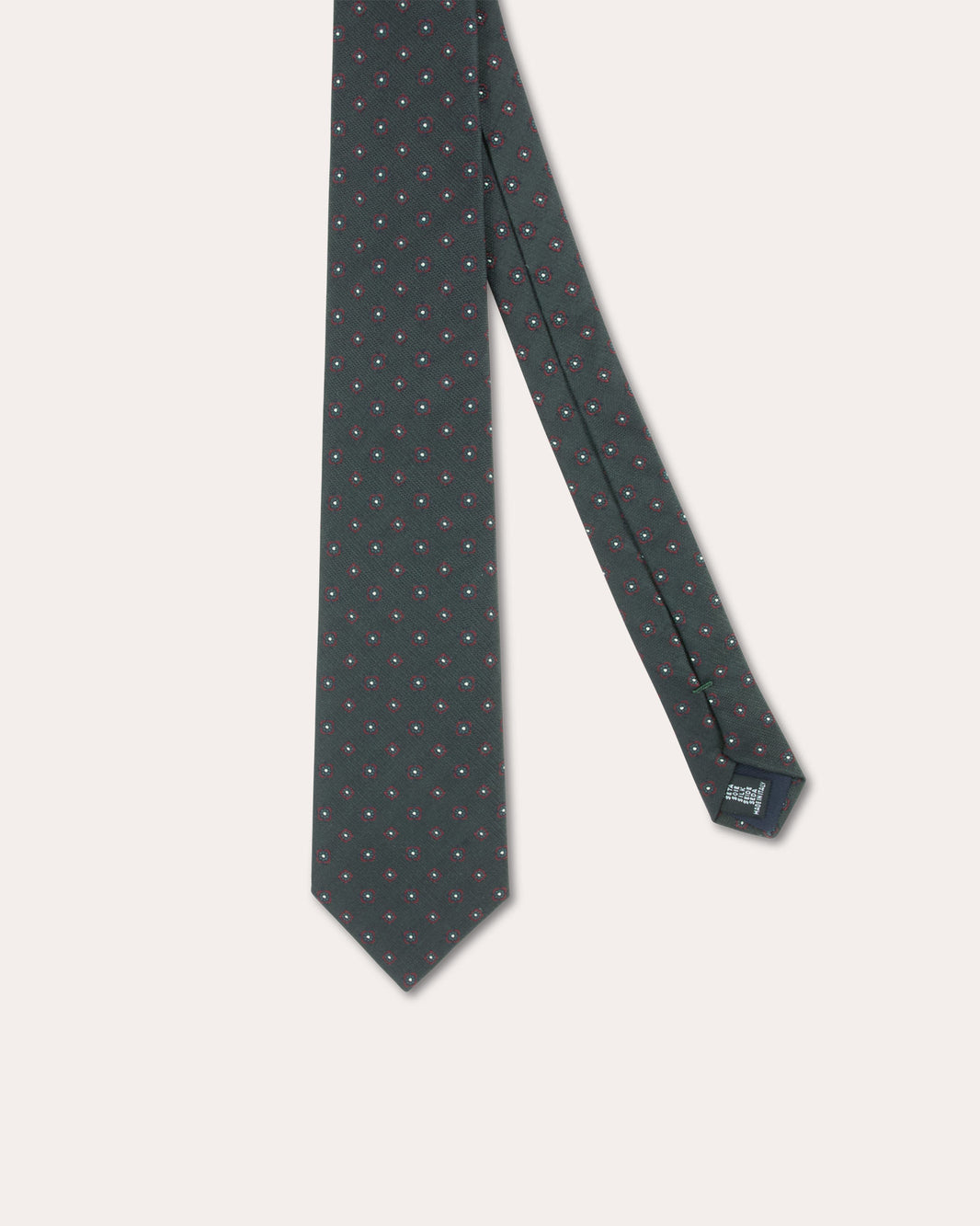 Green silk tie with burgundy patterns