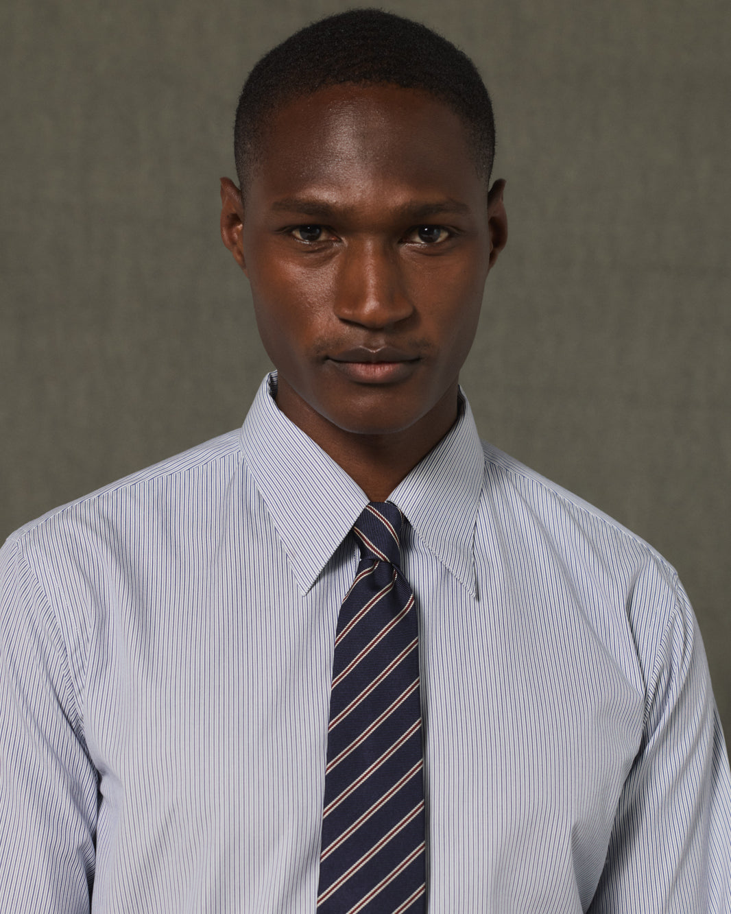 Navy silk tie with a burgundy stripe