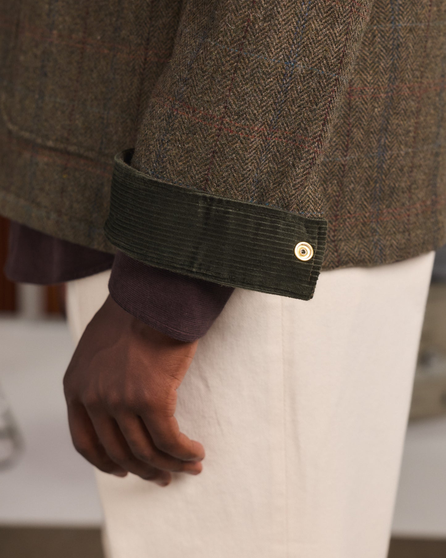 Veste en tweed de laine verte à chevrons