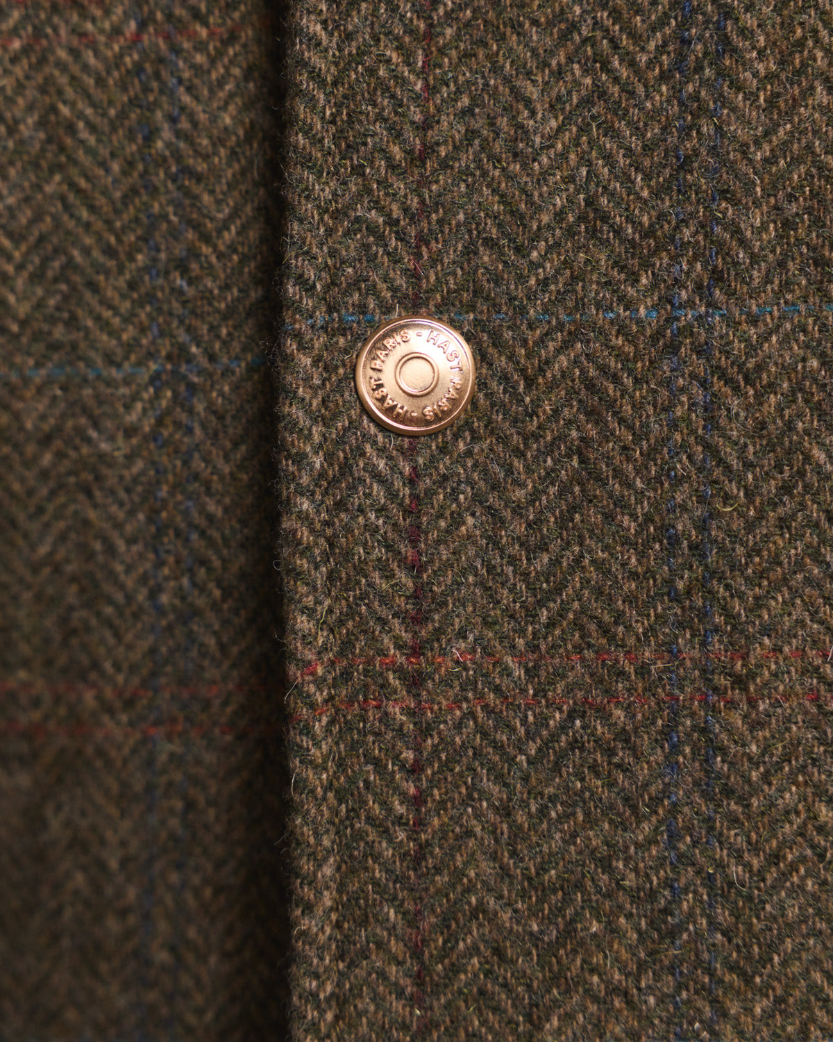 Veste en tweed de laine verte à chevrons