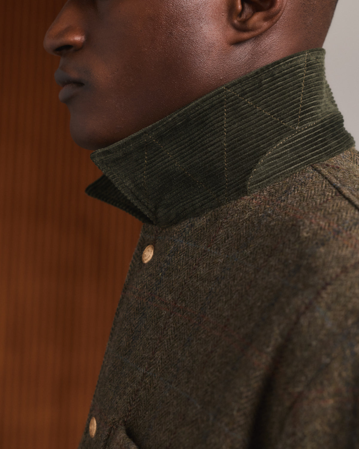 Veste en tweed de laine verte à chevrons