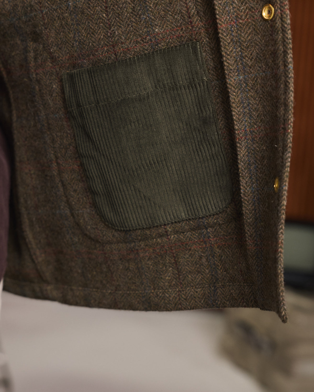 Veste en tweed de laine verte à chevrons