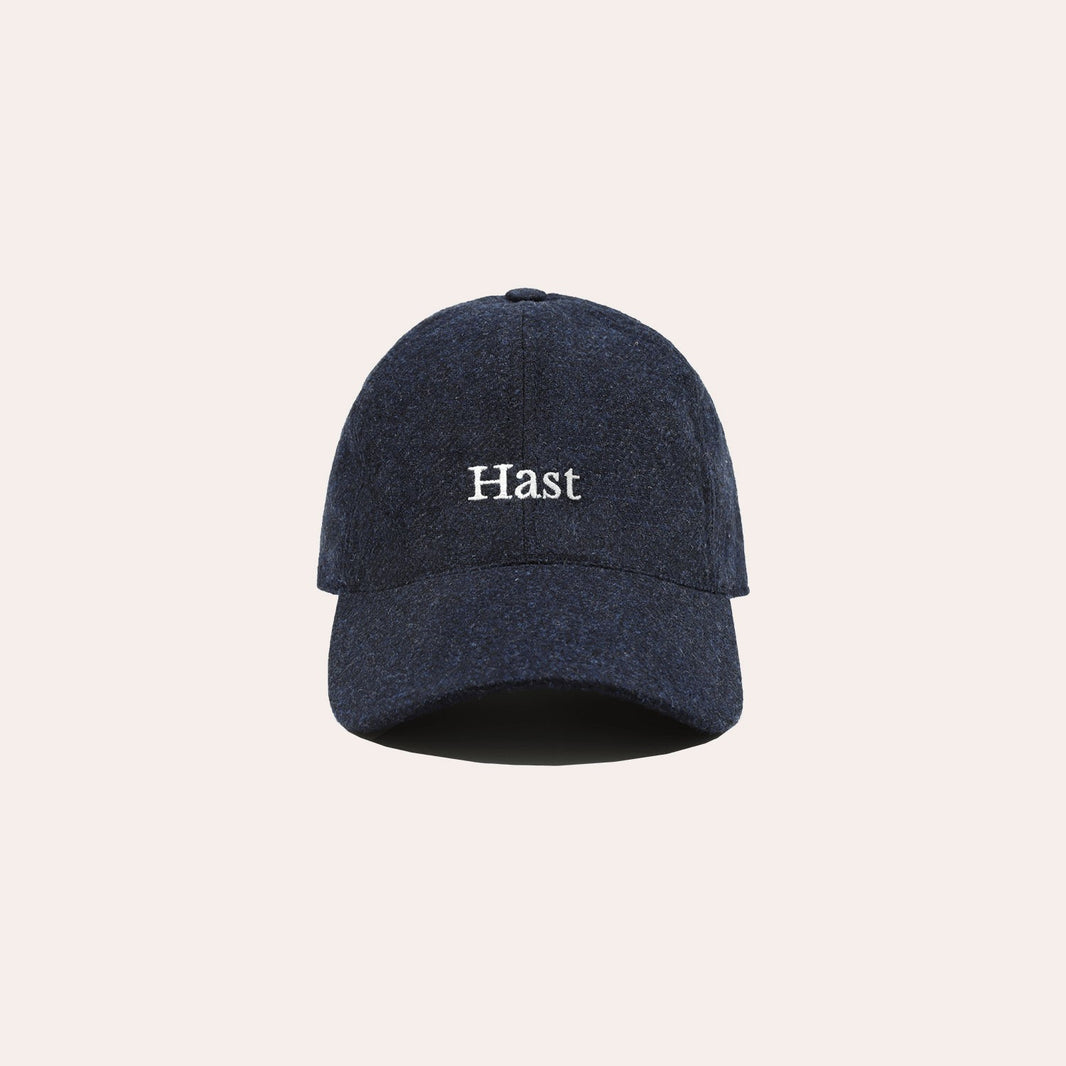 Ecru embroidered navy wool cap