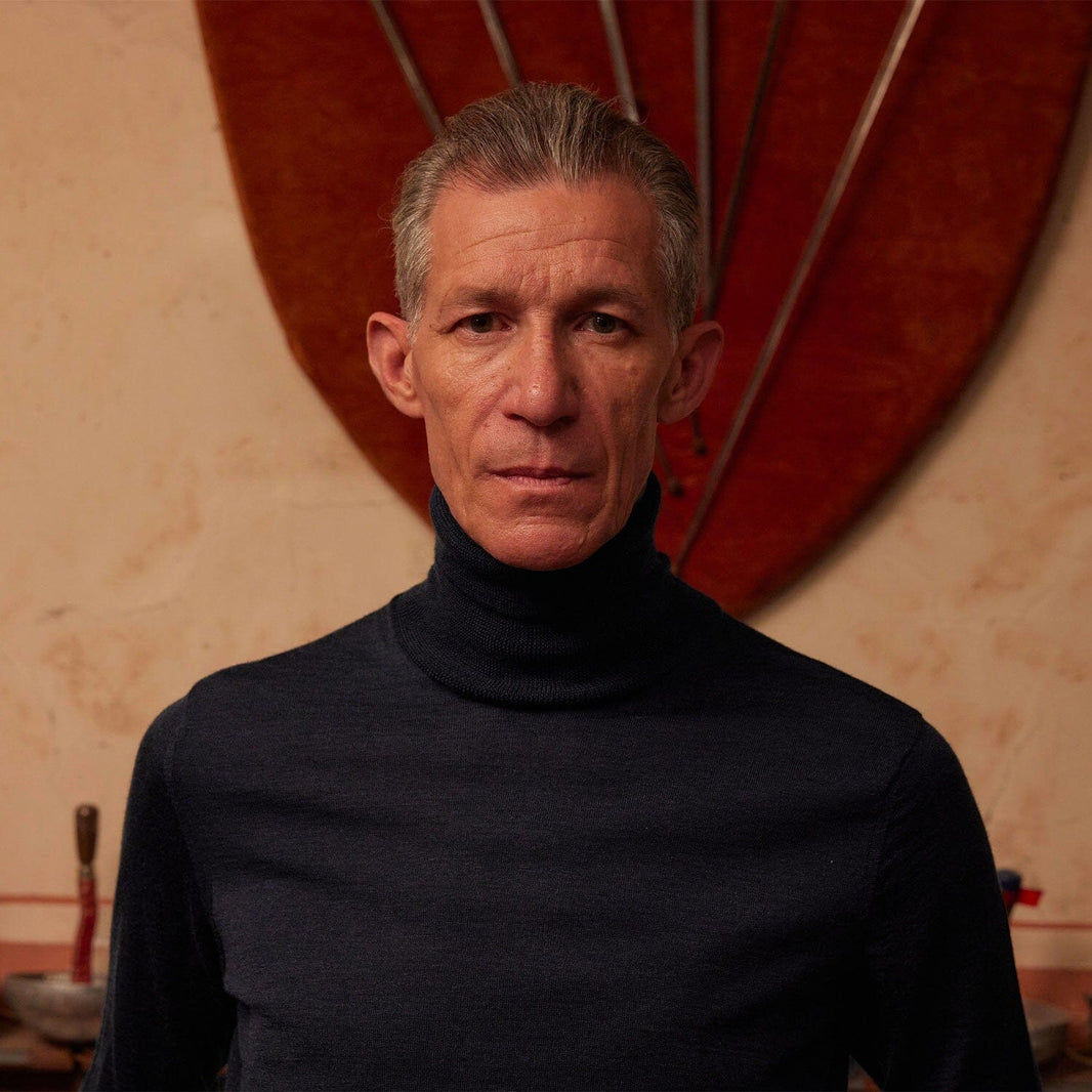 Pull à col roulé en laine mérinos bleu marine